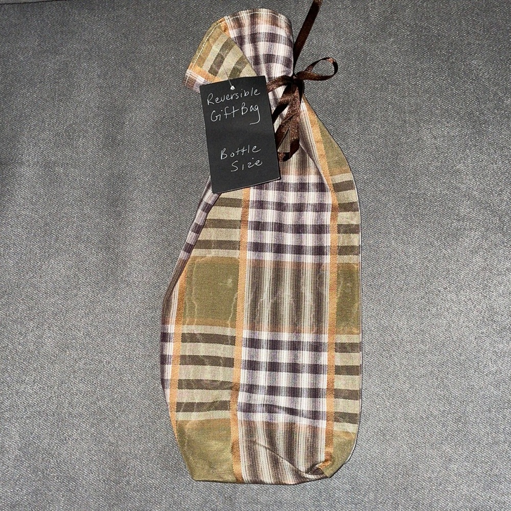 NWT.  Reversible gift/wine bag.  Bottle size.  15” length & 6” width.